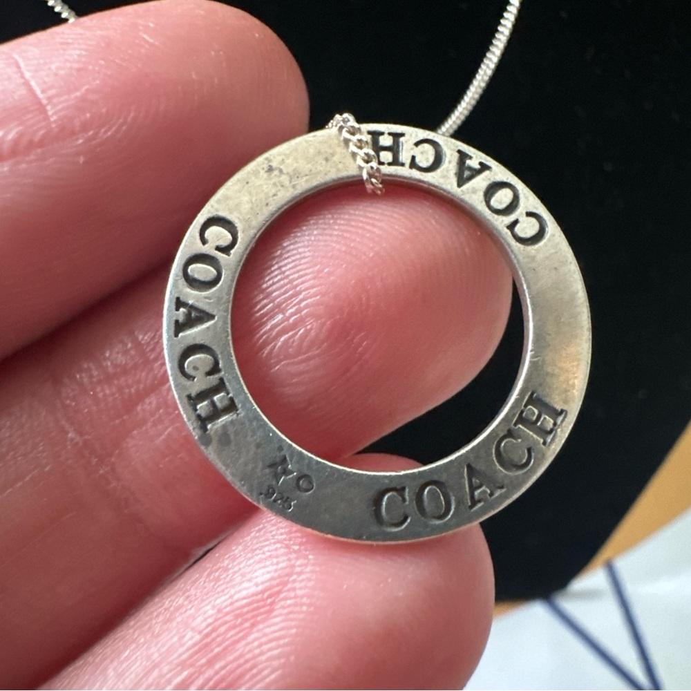 Coach 925 settling silver Round Logo Pendant no chain